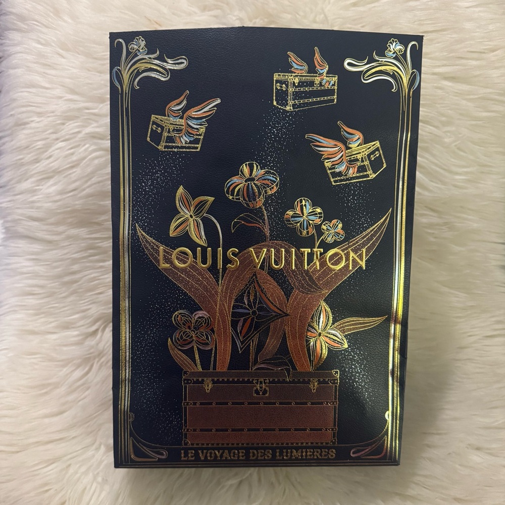 Louis Vuitton limited edition 2025 holiday shopping bag.